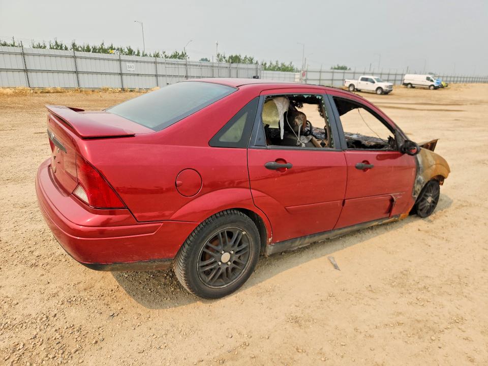 Foto 3 de la subasta – 2004 FORD FOCUS con VIN 1FAFP34384W122920
