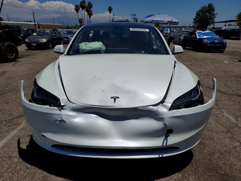 Photo 5 from auction – 2026 TESLA MODEL 3 with VIN 5YJ3E1EAXTF145106