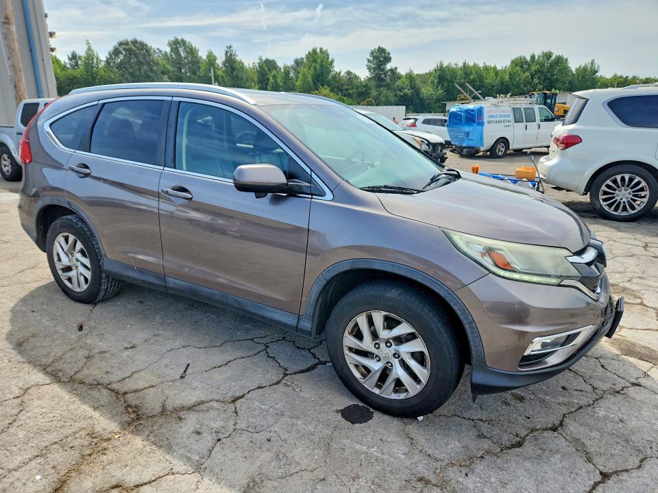 Photo 4 from auction – 2016 HONDA CR-V with VIN 5J6RM4H79GL052167