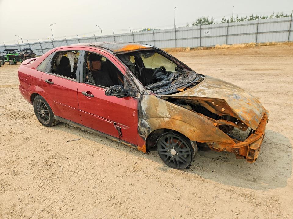Foto 4 de la subasta – 2004 FORD FOCUS con VIN 1FAFP34384W122920