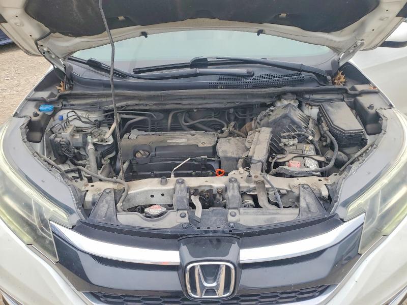 Photo 12 from auction – 2016 HONDA CR-V with VIN 5J6RM4H79GL071463