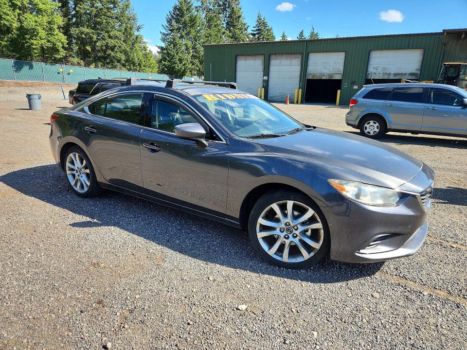 Photo 4 from auction – 2015 MAZDA 6 with VIN JM1GJ1V52F1201844