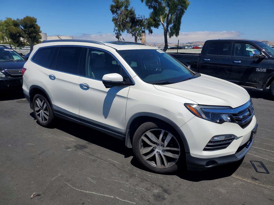 Photo 4 from auction – 2016 HONDA PILOT with VIN 5FNYF6H96GB078608