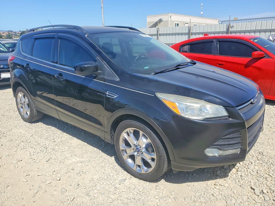 Photo 4 from auction – 2016 FORD ESCAPE with VIN 1FMCU0GX1GUB67017