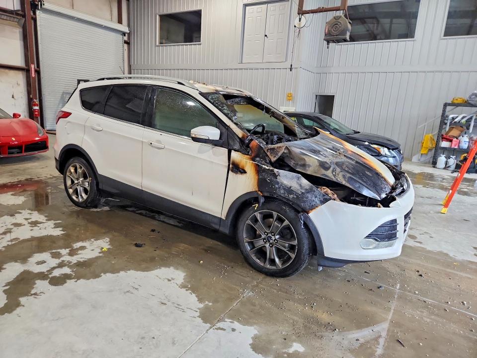 Photo 4 from auction – 2014 FORD ESCAPE with VIN 1FMCU9JX2EUD40943