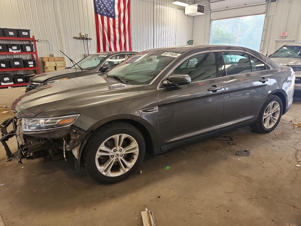 FORD TAURUS 2015 with VIN 1FAHP2E81FG112482 - Photo from auction