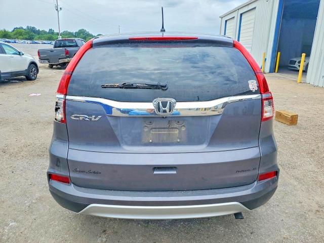 Photo 6 from auction – 2016 HONDA CR-V with VIN 3CZRM3H58GG720143