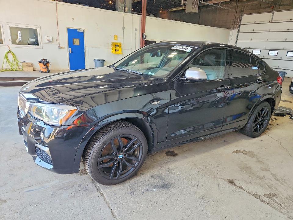 BMW X4 2018 with VIN 5UXXW7C59J0W65329 - Photo from auction