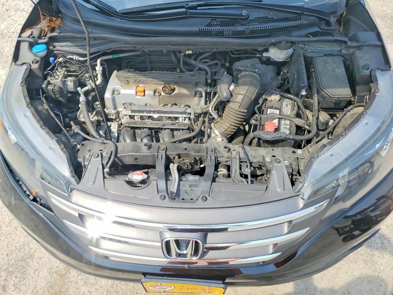 Photo 12 from auction – 2014 HONDA CR-V with VIN 5J6RM4H77EL070504