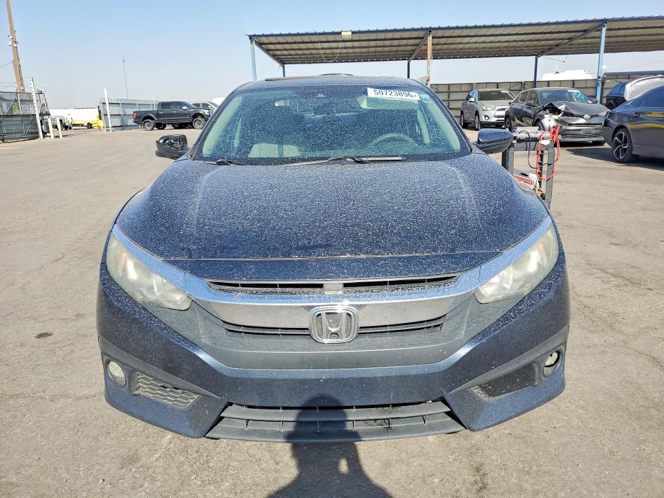 Photo 5 from auction – 2016 HONDA CIVIC with VIN 19XFC1F4XGE044073