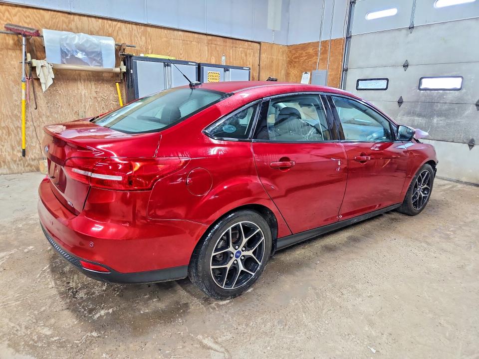 Photo 3 from auction – 2017 FORD FOCUS with VIN 1FADP3H29HL236599