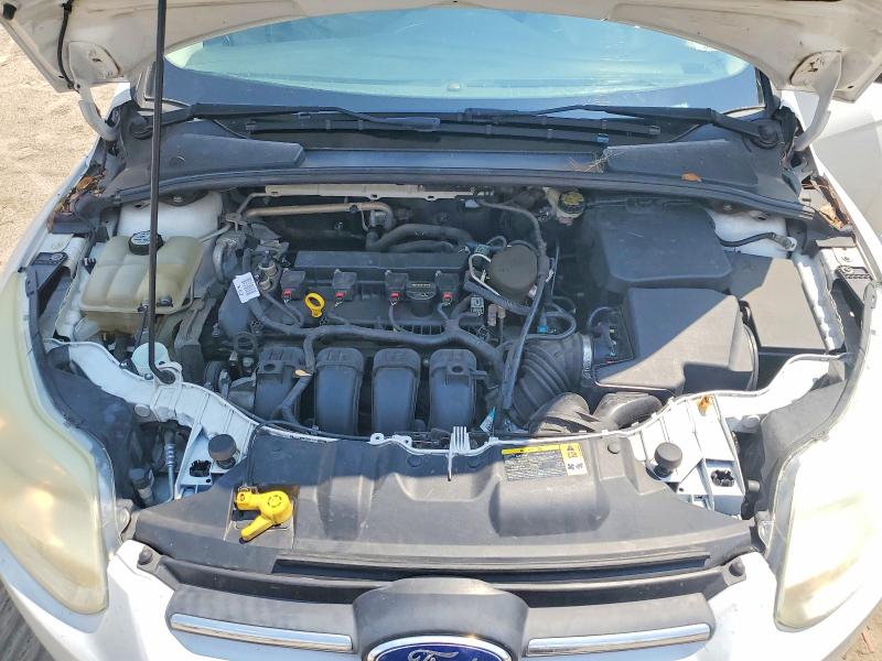 Photo 11 from auction – 2013 FORD FOCUS with VIN 1FADP3F26DL353988