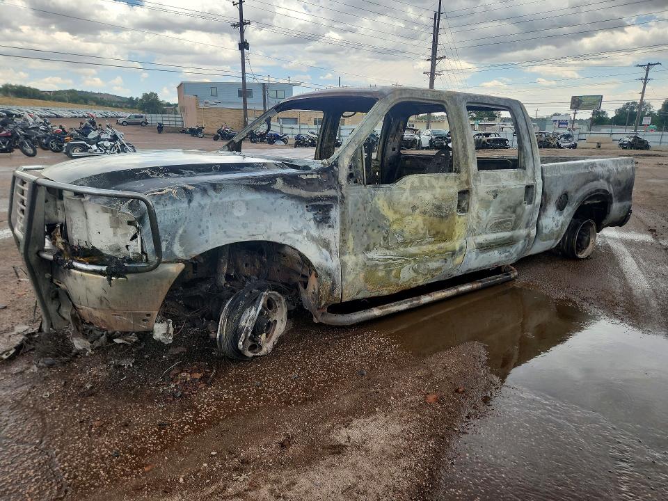 FORD F250 1999 with VIN 1FTNW21FXXEE62033 - Photo from auction