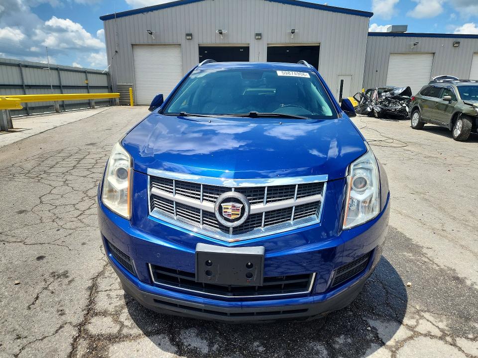 Photo 5 from auction – 2012 CADILLAC SRX with VIN 3GYFNDE32CS609989