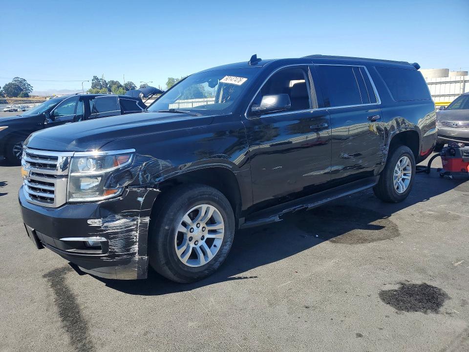CHEVROLET SUBURBAN 2019 with VIN 1GNSCHKC2KR167245 - Photo from auction