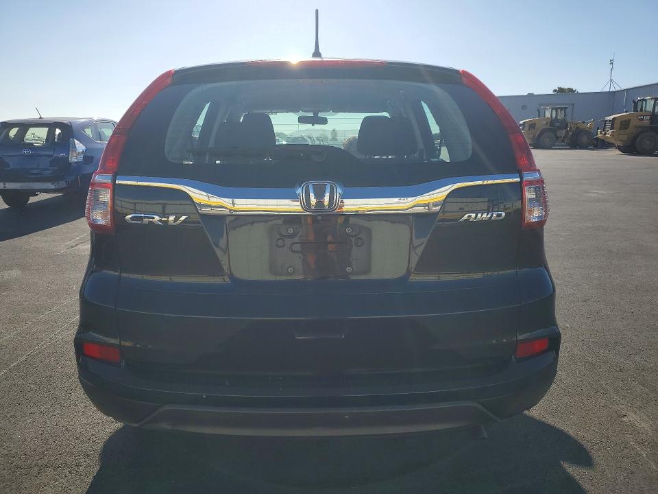 Photo 6 from auction – 2015 HONDA CR-V with VIN 5J6RM4H39FL074990