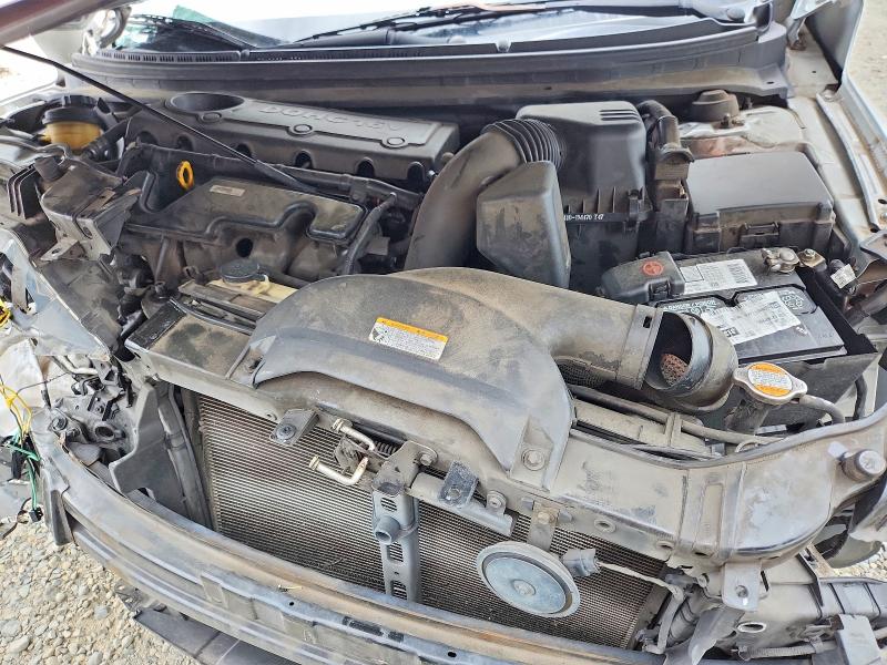 Photo 11 from auction – 2010 KIA FORTE with VIN KNAFU4A25A5198596