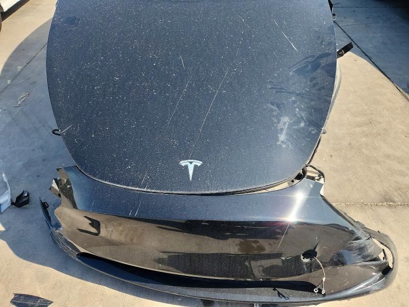 Photo 11 from auction – 2023 TESLA MODEL Y with VIN 7SAYGDEF0PF670116