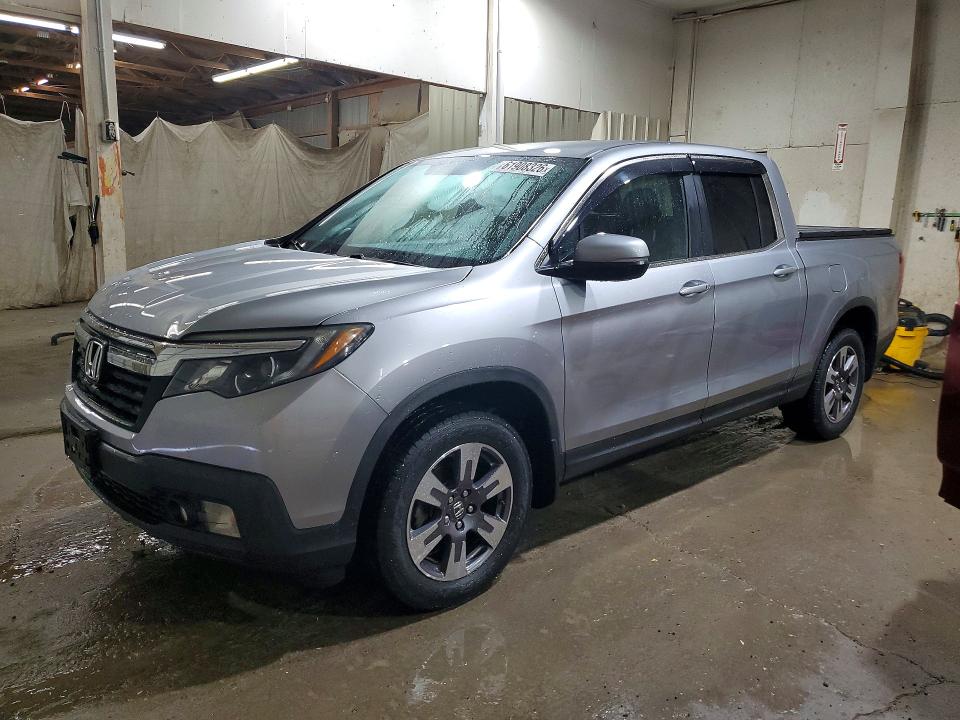 HONDA RIDGELINE 2017 with VIN 5FPYK3F63HB014361 - Photo from auction