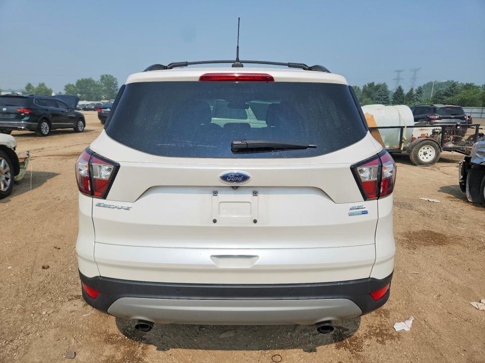 Photo 6 from auction – 2018 FORD ESCAPE with VIN 1FMCU9HD2JUC04768