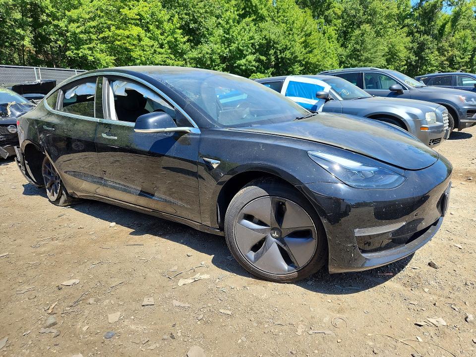 Снимка 4 от търг – 2018 TESLA MODEL 3 с VIN 5YJ3E1EA2JF034482