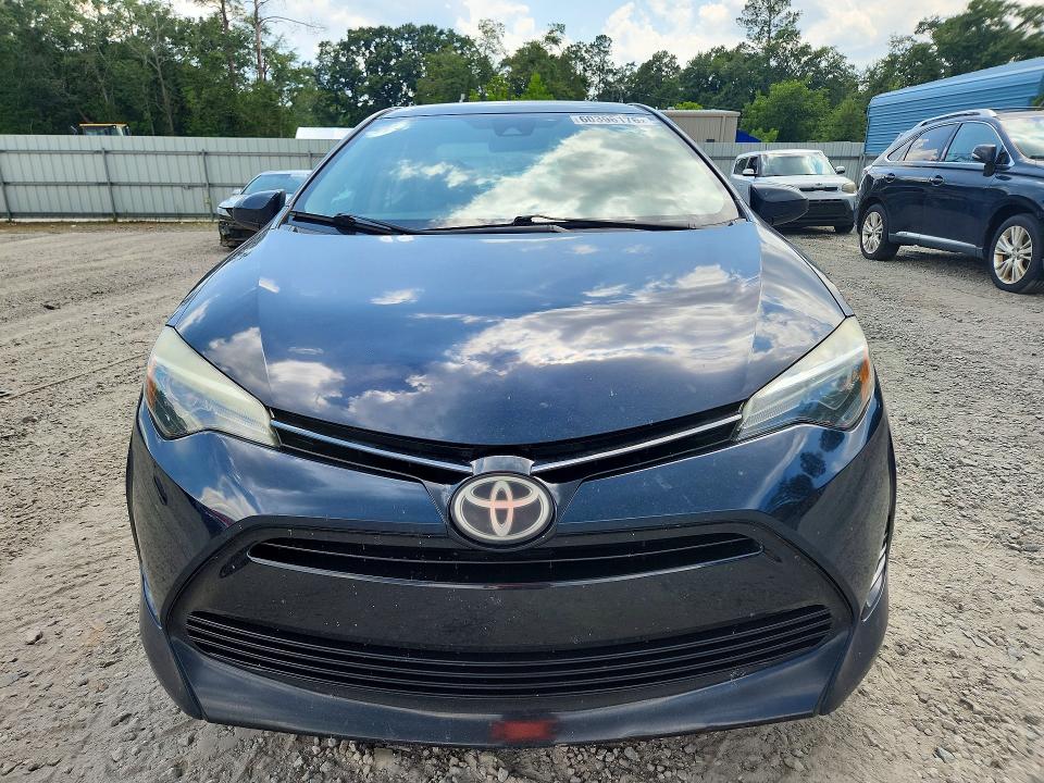 Photo 5 from auction – 2018 TOYOTA COROLLA with VIN 5YFBURHE0JP829739