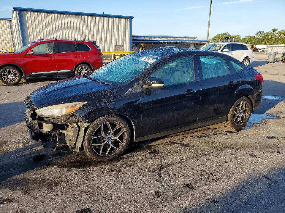 FORD FOCUS 2017 with VIN 1FADP3H2XHL337912 - Photo from auction