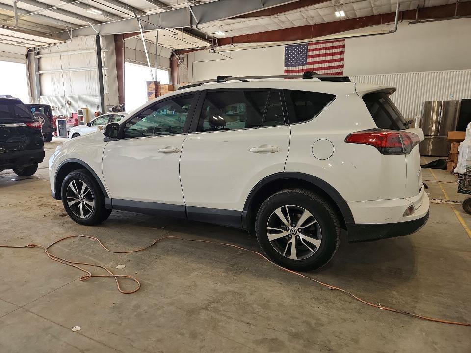 Photo 2 from auction – 2018 TOYOTA RAV4 with VIN 2T3RFREV6JW721242