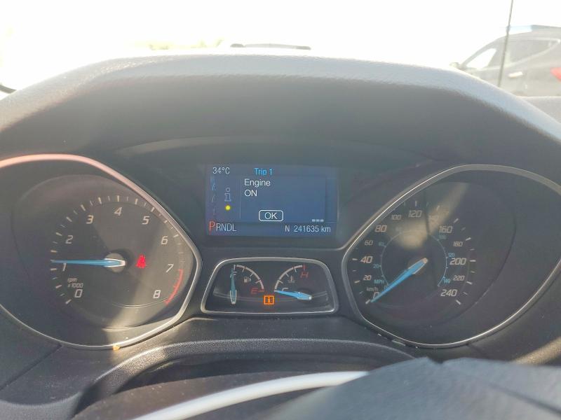 Photo 9 from auction – 2014 FORD FOCUS with VIN 1FADP3F2XEL297135