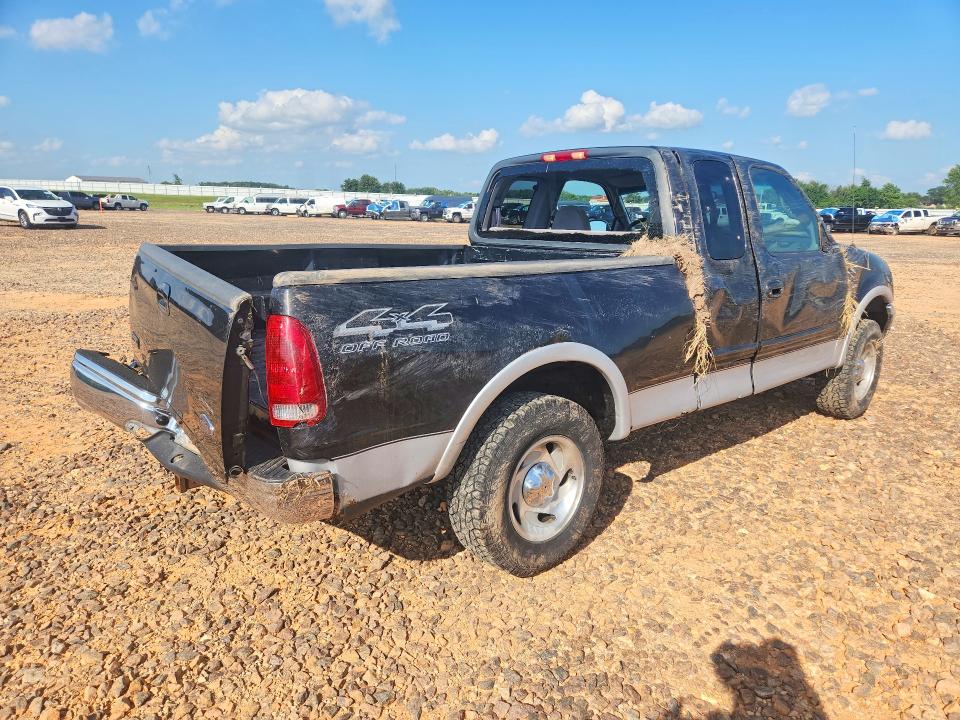 Photo 3 from auction – 2000 FORD F150 with VIN 1FTRX18W9YNC07731
