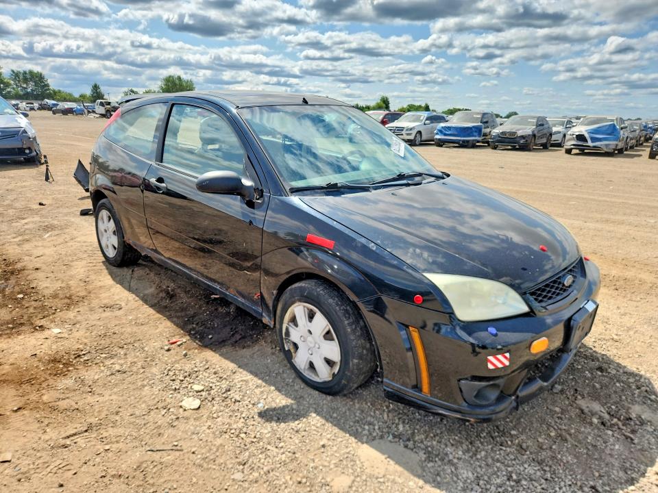 Foto 4 de la subasta – 2006 FORD FOCUS con VIN 1FAFP31N56W218223