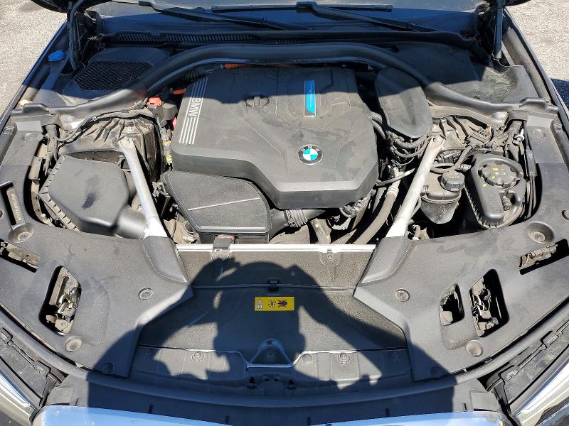 Photo 11 from auction – 2023 BMW 530E with VIN WBA13AG00PCM30463