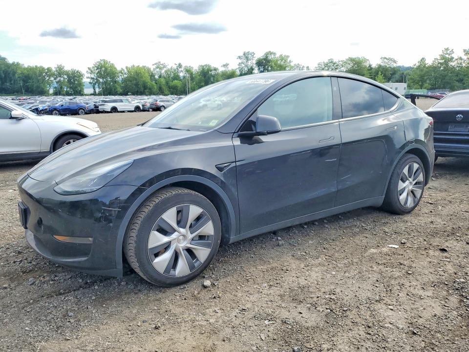 TESLA MODEL Y 2023 with VIN 7SAYGAEE0PF921478 - Photo from auction