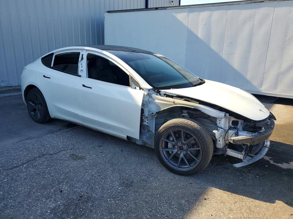 Photo 4 from auction – 2022 TESLA MODEL 3 with VIN 5YJ3E1EB7NF267031