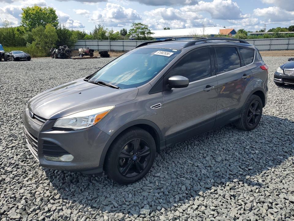 FORD ESCAPE 2014 with VIN 1FMCU9GX5EUA44015 - Photo from auction