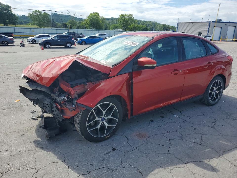 FORD FOCUS 2018 with VIN 1FADP3H29JL303367 - Photo from auction