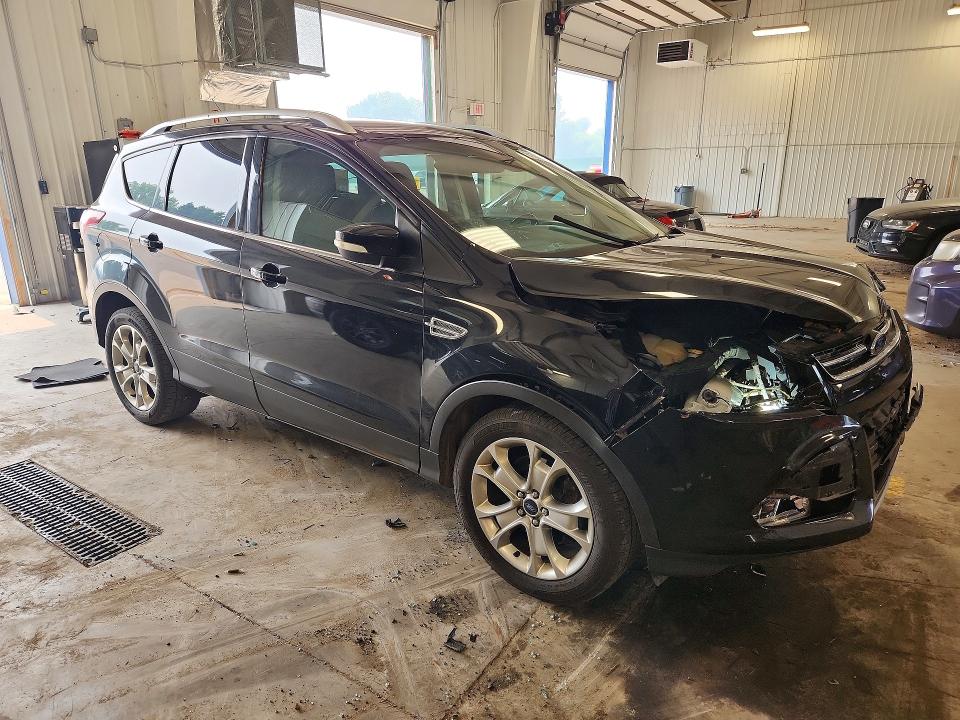 Photo 4 from auction – 2016 FORD ESCAPE with VIN 1FMCU9J99GUC67963