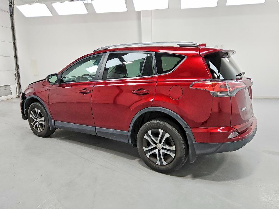 Photo 2 from auction – 2018 TOYOTA RAV4 with VIN 2T3BFREV1JW743988