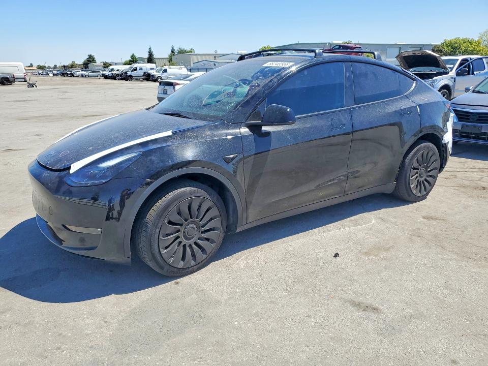 TESLA MODEL Y 2023 with VIN 7SAYGDEE8PF816799 - Photo from auction