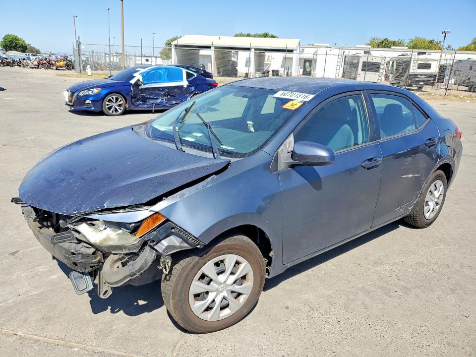 TOYOTA COROLLA 2016 with VIN 5YFBURHE8GP385227 - Photo from auction
