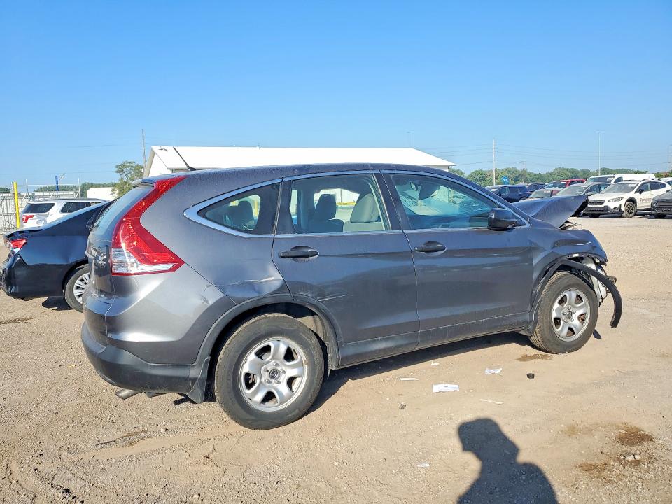 Photo 3 from auction – 2014 HONDA CR-V with VIN 2HKRM4H38EH693606