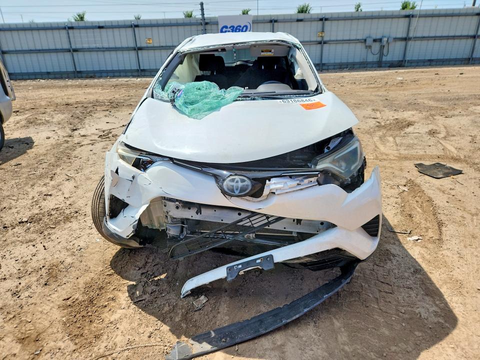 Photo 5 from auction – 2018 TOYOTA RAV4 with VIN JTMBFREV1JJ247930