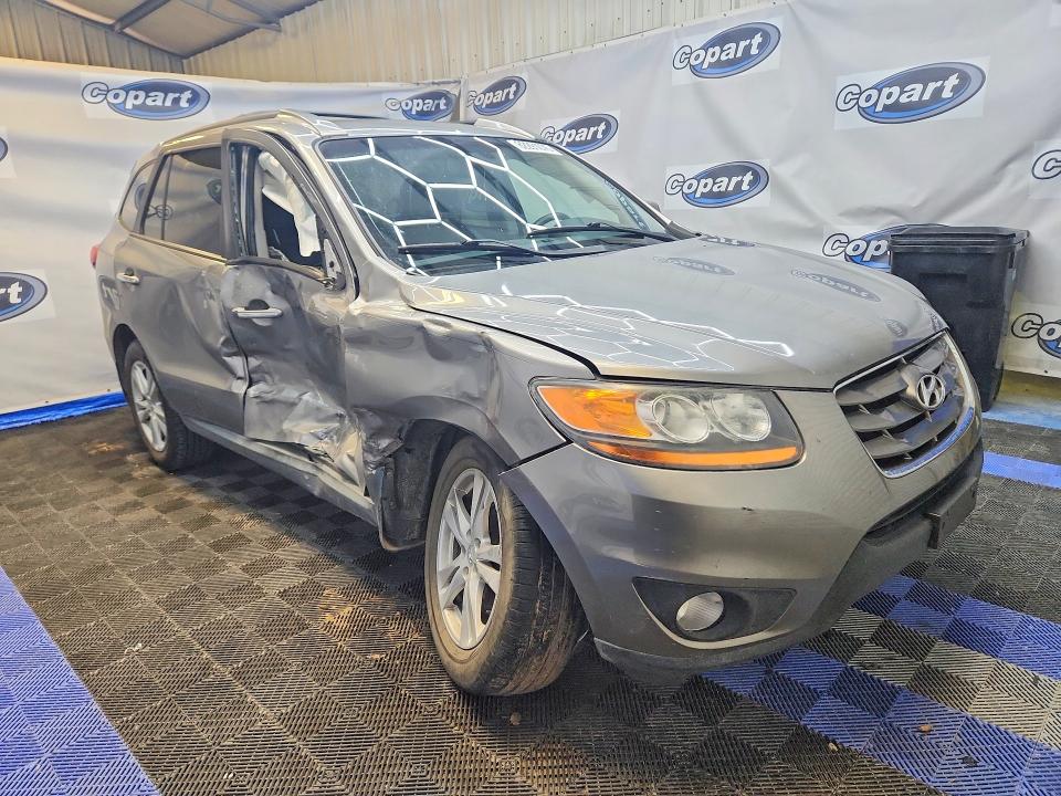 Photo 4 from auction – 2011 HYUNDAI SANTA FE with VIN 5XYZK4AG9BG034679