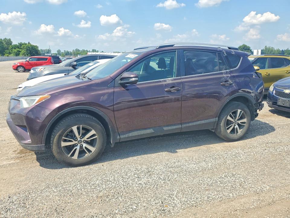 TOYOTA RAV4 2017 z numerem VIN 2T3WFREV1HW401873 - Zdjęcie z aukcji