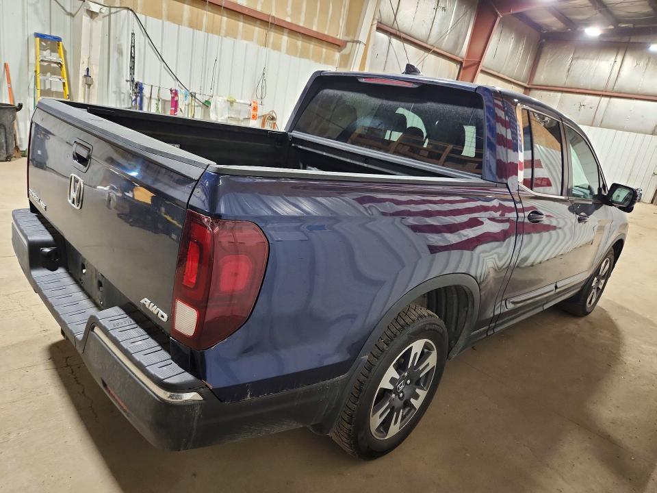Photo 3 from auction – 2017 HONDA RIDGELINE with VIN 5FPYK3F67HB011690