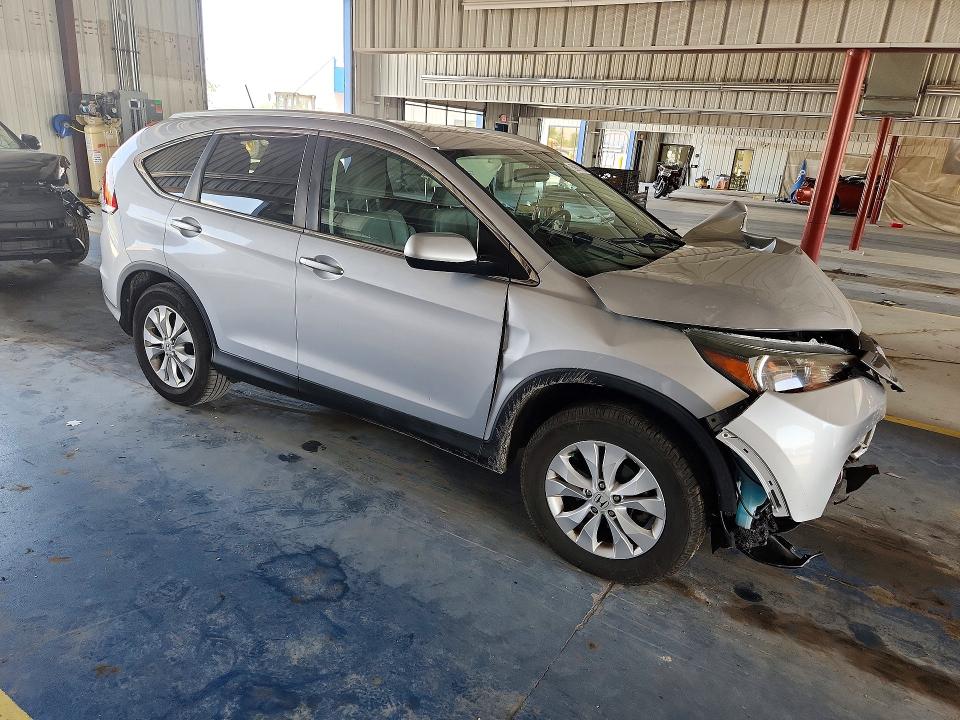 Photo 4 from auction – 2014 HONDA CR-V with VIN 2HKRM4H74EH676014