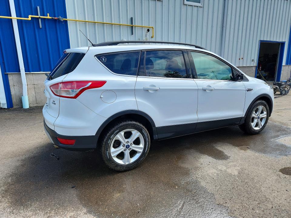Photo 3 from auction – 2016 FORD ESCAPE with VIN 1FMCU9GX9GUA87212