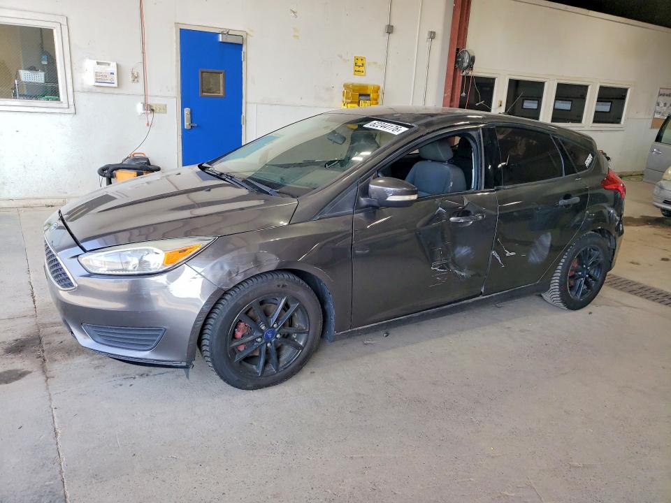 FORD FOCUS 2015 with VIN 1FADP3K25FL281173 - Photo from auction