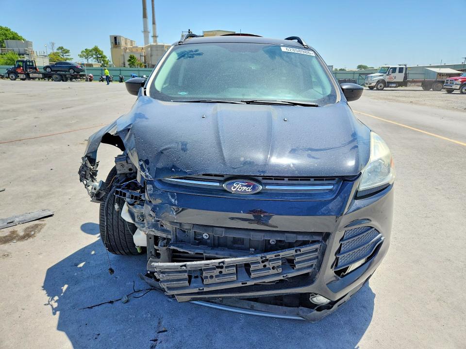 Photo 5 from auction – 2016 FORD ESCAPE with VIN 1FMCU0GX2GUA97530