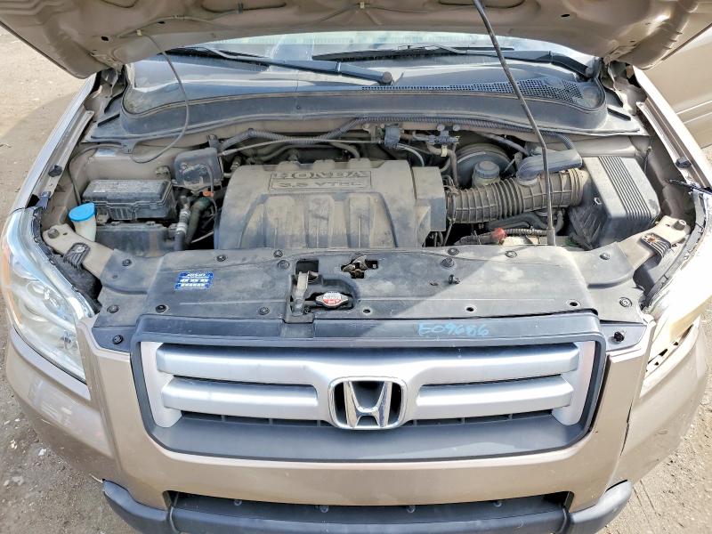 Photo 12 from auction – 2006 HONDA PILOT with VIN 5FNYF18406B018376
